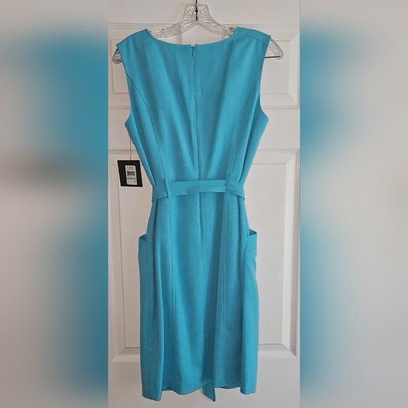Cocktail length turquoise colored dress. Pockets and belt. Size 8 - Picture 5 of 7